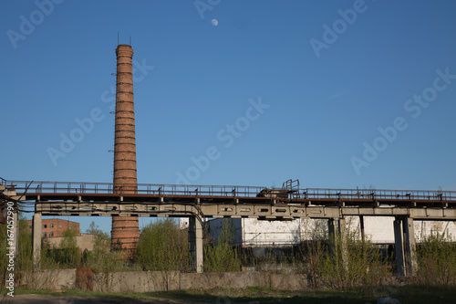 Tableau sur toile Dirty industry zone mess dismanting cement wall pipes