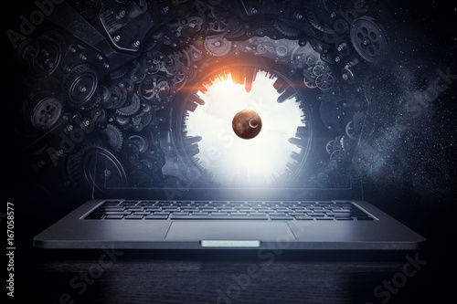 Laptop and construction concept. Mixed media photo