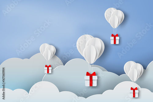 paper art of balloon white  floating and Gift Box on in the air blue sky background,Christmas,Festival,vector