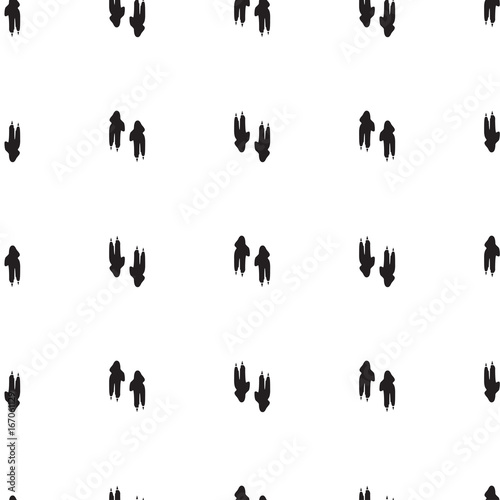 Minimal seamless pattern with dinosaur foots. Black and white colors. Vector illustration.