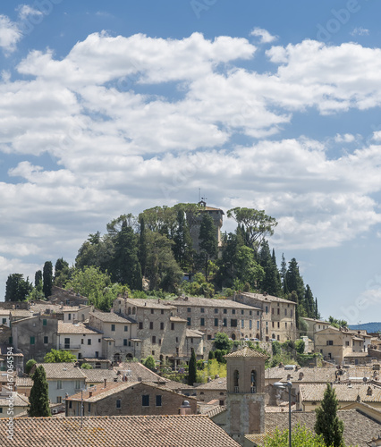 Magnificent view of the ancient hilltop village of Cetona, Siena, Italy, on a beautiful sunny day with some white clouds