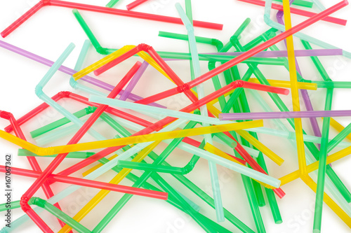 Colorful drinking straws on white background