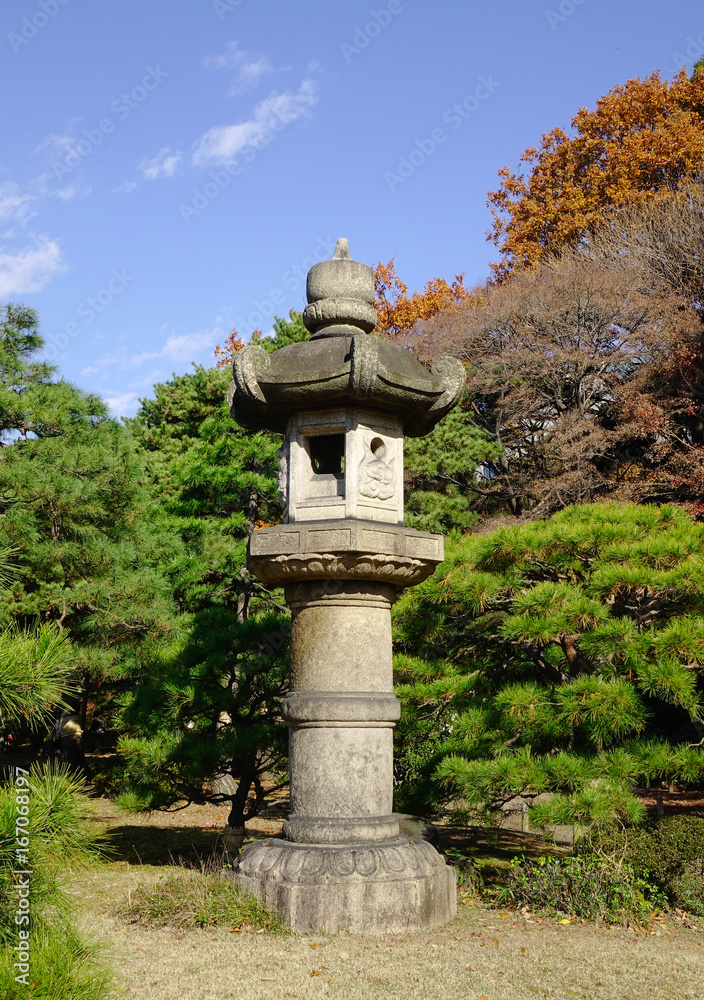 Japanese stone lantern at the park Japanese stone lantern at the park
