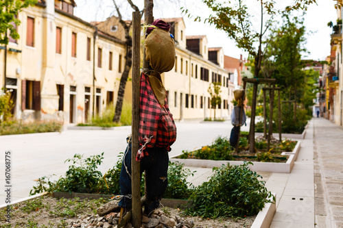 Scarecrow on the street photo