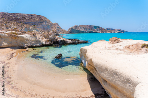 Amazing view of Koufonisi island with magical turquoise waters, lagoons, tropical beaches of pure white sand and ancient ruins on Crete, Greece photo