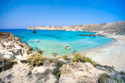 Fototapeta Naklejka Na Ścianę i Meble -  Amazing view of Koufonisi island with magical turquoise waters, lagoons, tropical beaches of pure white sand and ancient ruins on Crete, Greece