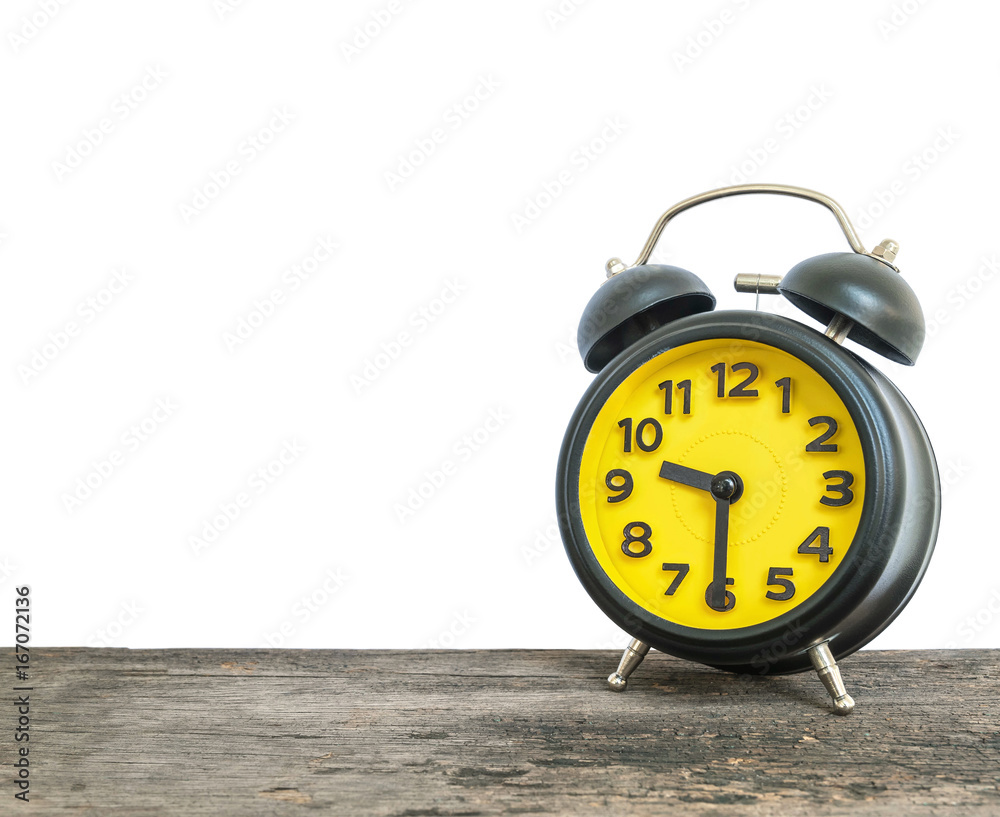Closeup black and yellow alarm clock for decorate show half past nine or 9:30  a.m. on old brown wood desk isolated on white background with copy space  foto de Stock | Adobe Stock