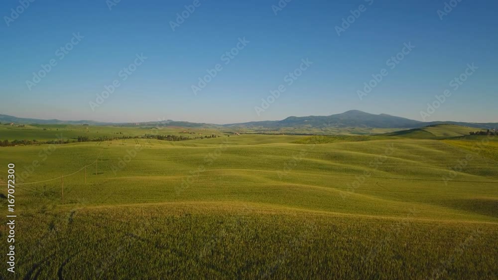 Typical landscape of the Val d'Orcia in Tuscany, Italy. Aerial view Typical landscape of the Val d'Orcia in Tuscany, Italy. Aerial view