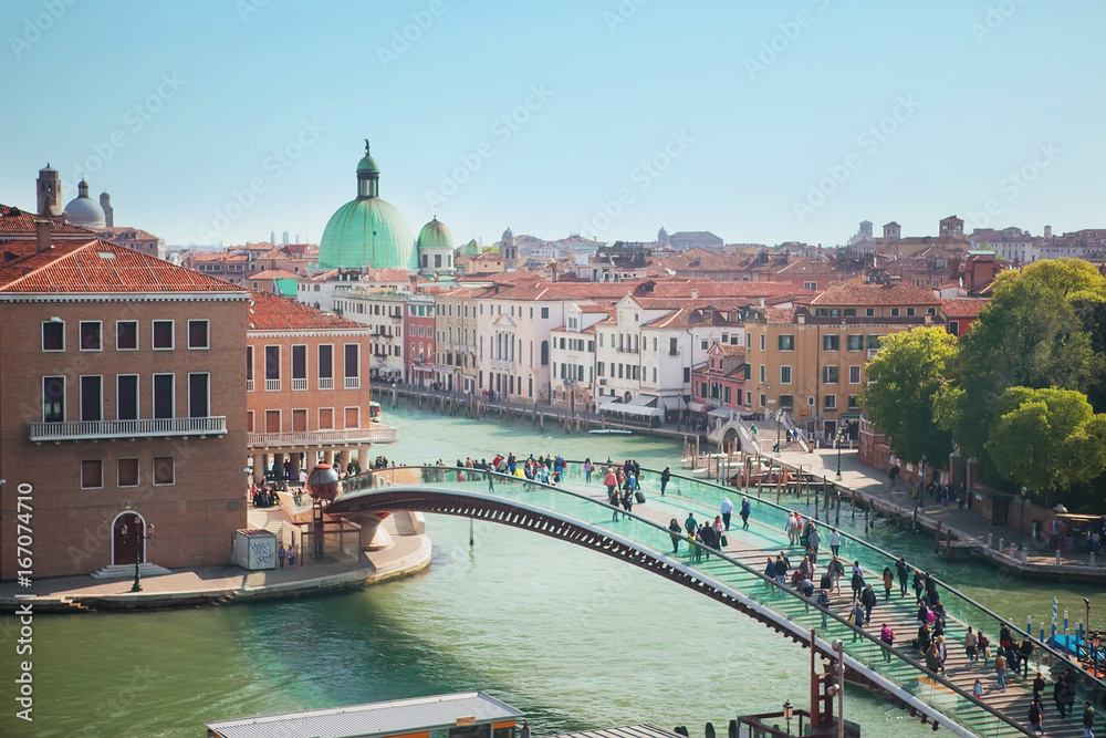 VENICE, ITALY - APRIL 23, 2017. View of the Constitution Bridge, Grand Canal and the Church of San Simeon Piccolo.