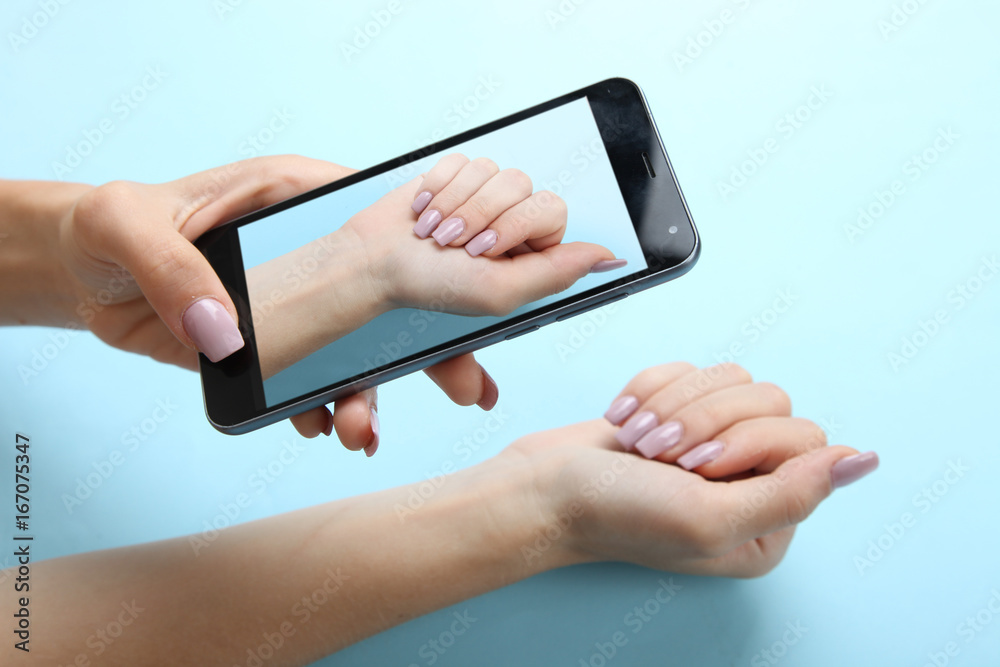 girl is taking pictures of manicure girl is taking pictures of manicure