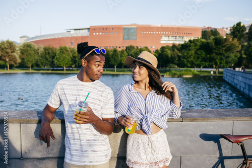 Couple with refreshing drinks