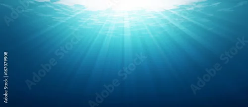 Panel kuchenny z motywem Underwater blue sea background photo with with sun and sunlight shining under the sea.