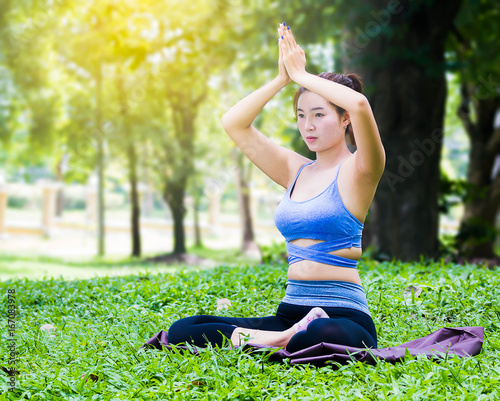 Women doing yoga exercise for health.