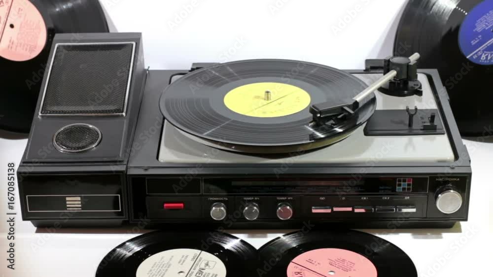 Playback of vinyl records on a background of Out of the Past Playback of vinyl records on a background of Out of the Past