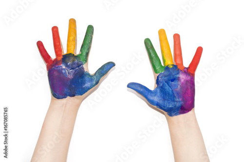 Children's hands painted with colorful paint.