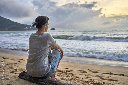 beautiful alone sensual girl on the beach