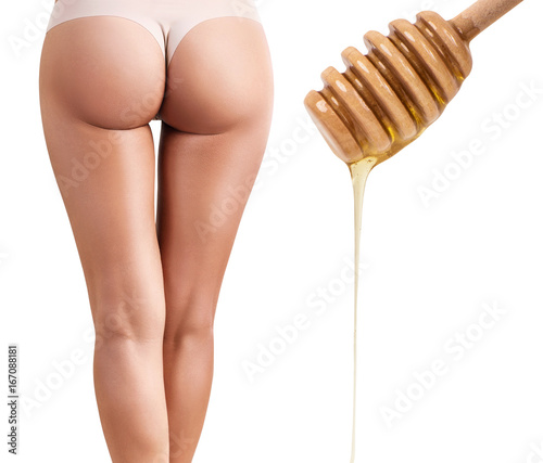 Body depilation by honey or sugar pasta. photo
