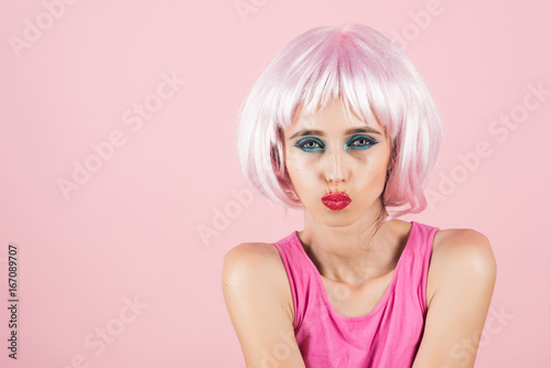 woman with pink hair wig and fashionable makeup