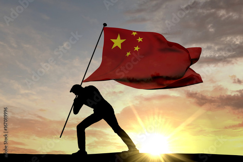 China flag being pushed into the ground by a male silhouette. 3D Rendering