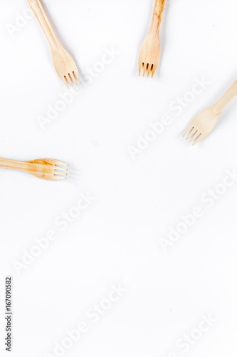 wooden kitchen utensils on white background top view mock up