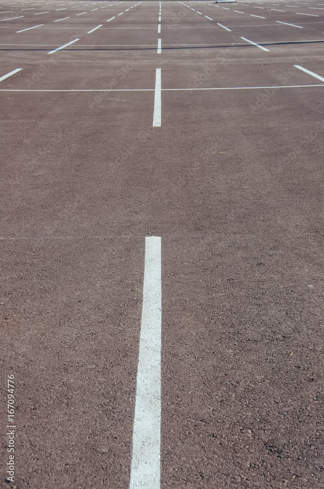 Obraz premium Empty open air parking with gray asphalt and mark up