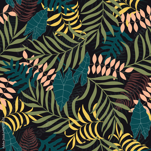 Tropical background with palm leaves. Seamless floral pattern