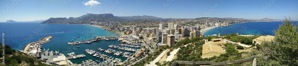 Calpe Panorama. Panoramic view of Calpe from famous rock - Penon de Ifach, overlooking the coast, the harbor, lake and the city.