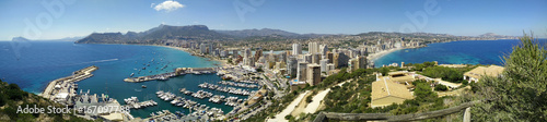 Calpe Panorama. Panoramic view of Calpe from famous rock - Penon de Ifach, overlooking the coast, the harbor, lake and the city.