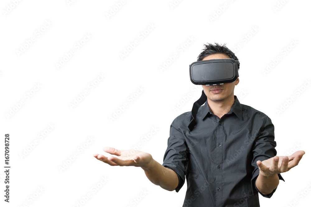 Young man using a VR headset and experiencing virtual reality isolated on white background Young man using a VR headset and experiencing virtual reality isolated on white background