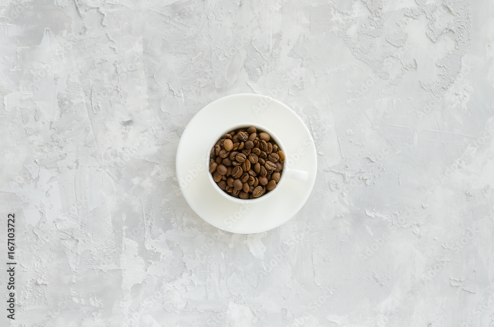 Cup with coffee beans Cup with coffee beans