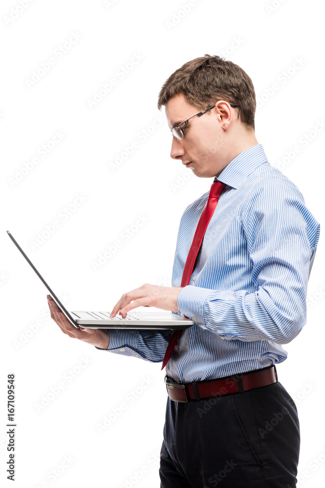 Vertical portrait of a chief accountant in glasses with a laptop on a white background