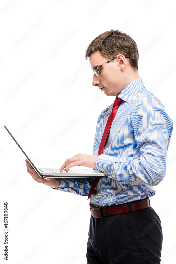 Vertical portrait of a chief accountant in glasses with a laptop on a white background Vertical portrait of a chief accountant in glasses with a laptop on a white background