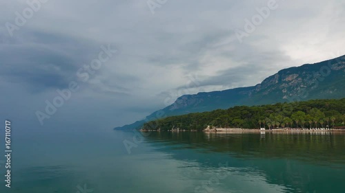 Wallpaper Mural Partial view of Akyaka shoreline (Gulf of Gokova, Mugla, Turkey) on a very calm, hazy day. Color of the sea blends into the color of the sky at the horizon.
 Torontodigital.ca