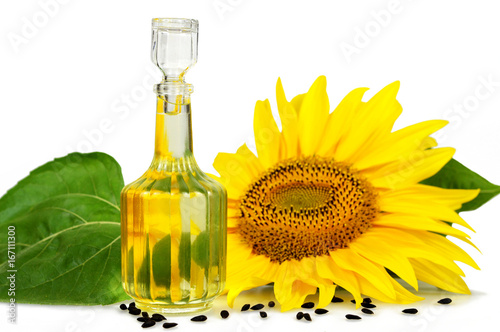 Sunflower oil and sunflower isolated on white background