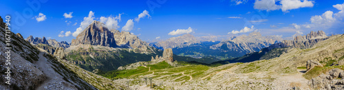 Great panorama view of the top Tofana di Rozes and Cinque Torri range in  Dolomites, South Tyrol. Location Cortina d'Ampezzo, Italy, Europe. Dramatical cloudy scene. Beauty of mountains world. photo