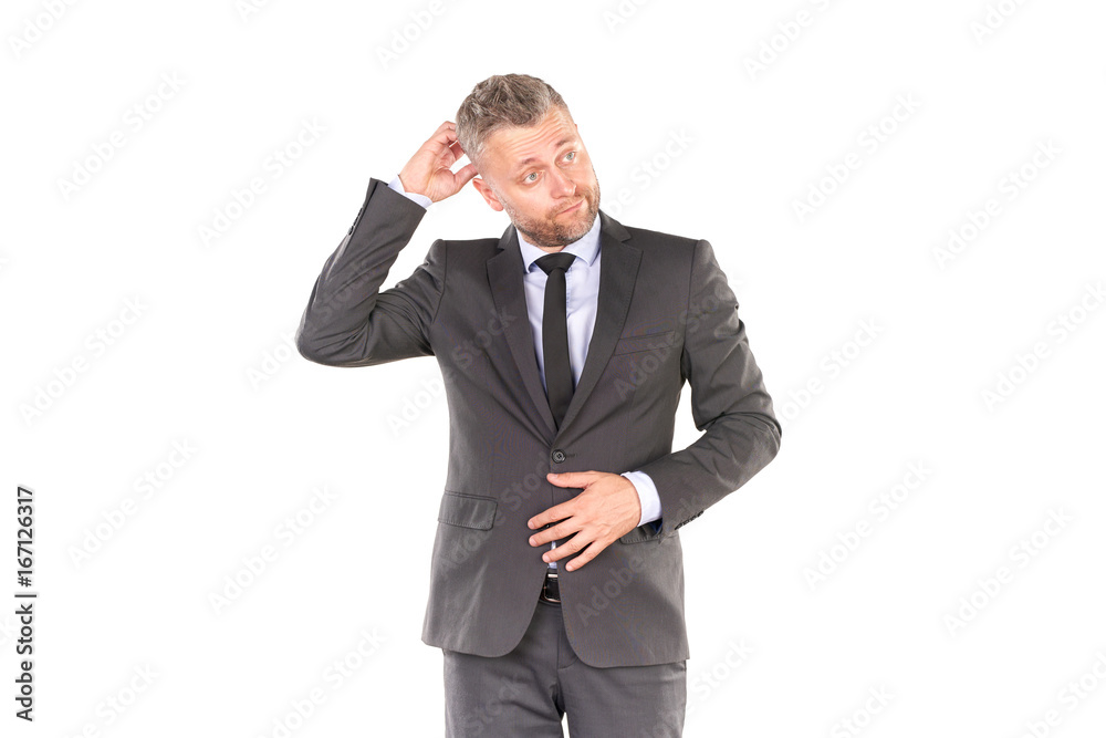 Portrait of middle-aged businessman in elegant suit posing against white background Portrait of middle-aged businessman in elegant suit posing against white background