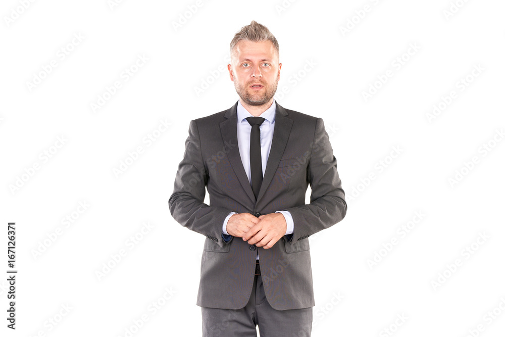 Portrait of middle-aged businessman in elegant suit posing against white background Portrait of middle-aged businessman in elegant suit posing against white background