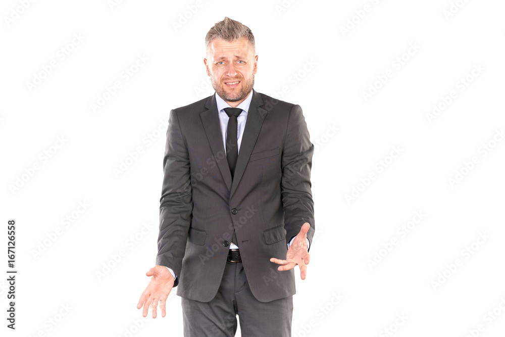 Portrait of middle-aged businessman in elegant suit posing against white background Portrait of middle-aged businessman in elegant suit posing against white background
