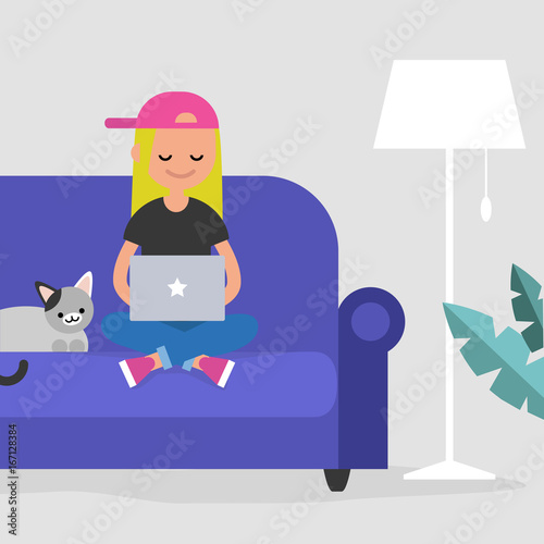 Young female freelancer working at home / flat editable vector illustration, clip art