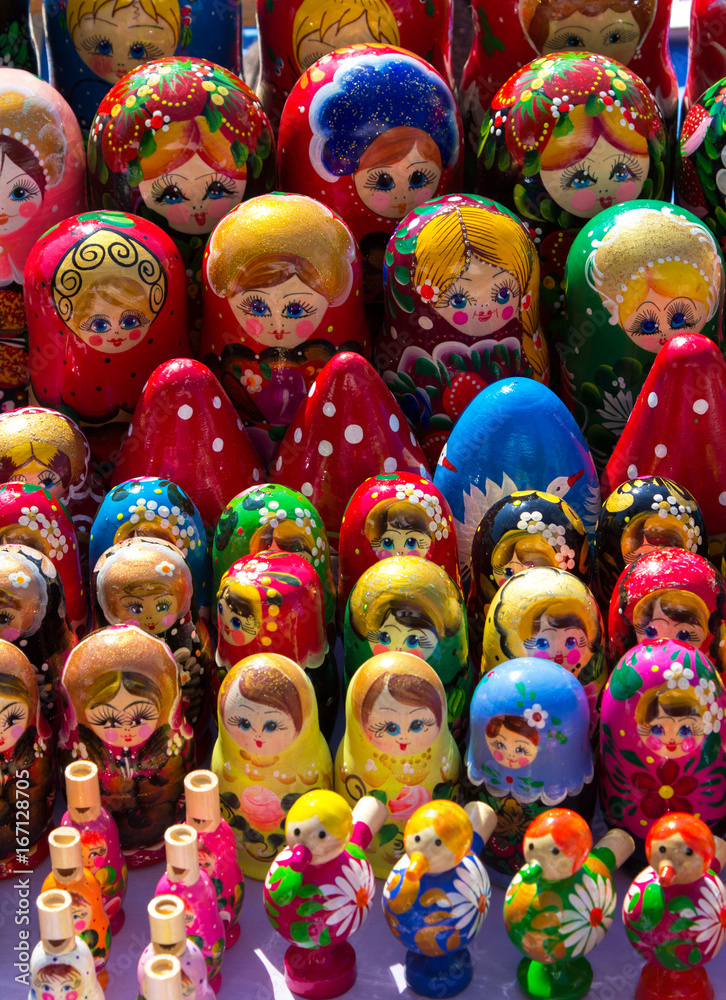 Many colored matryoshkas. Nesting doll. Famous Russian handmade souvenir of wood.