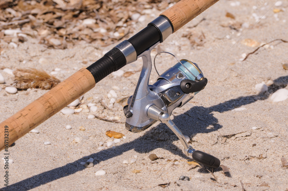rod and reel on a beach in Sardegna