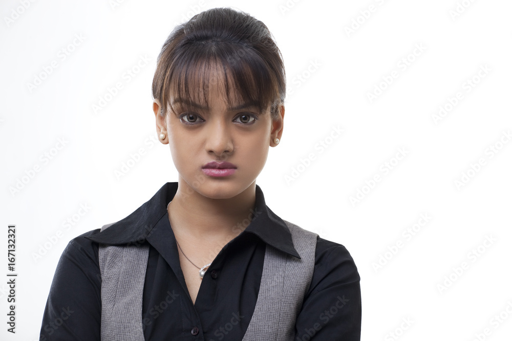Close-up of confident young businesswoman over white background Close-up of confident young businesswoman over white background