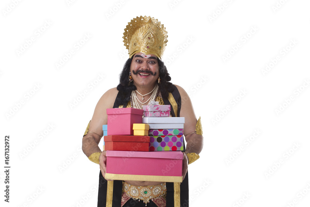Fototapeta premium Man dressed as Raavan holding gifts