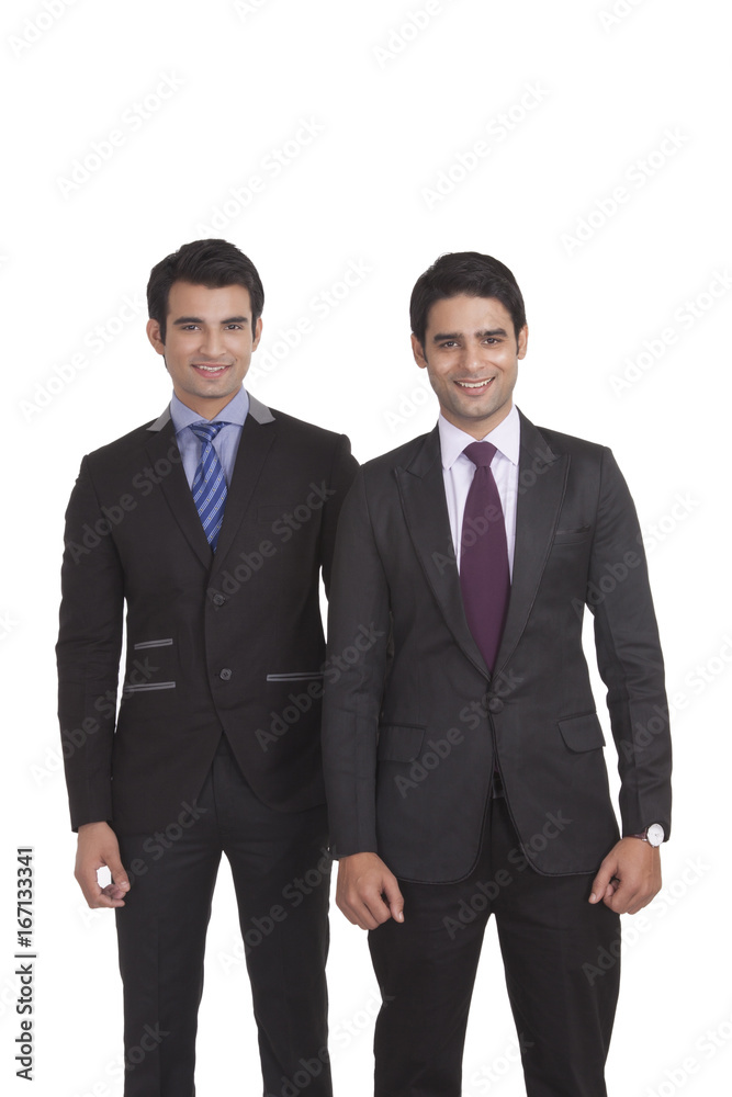Portrait of two businessmen smiling Portrait of two businessmen smiling