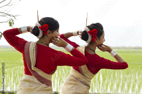 Backview of Bihu dancers  photo