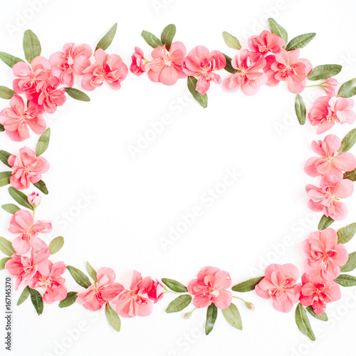 Floral frame with space for text made of pink hydrangea flowers, green leaves, branches on white background. Flat lay, top view. Floral background. Frame of flowers. © Floral Deco