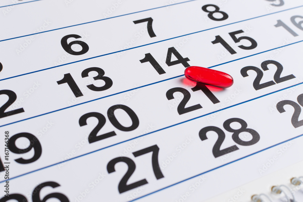 Red pill on the calendar. Schedule medication