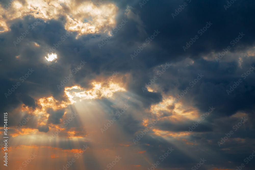dramatic sunset with clouds and sun rays