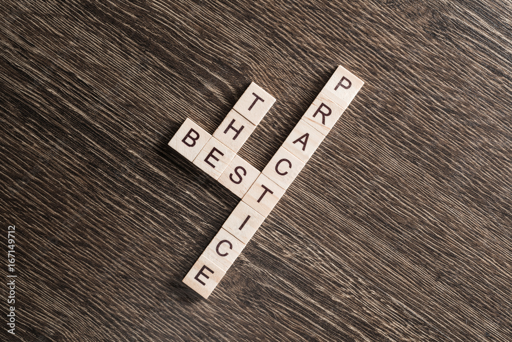 Conceptual business keywords on table with elements of game making crossword Conceptual business keywords on table with elements of game making crossword
