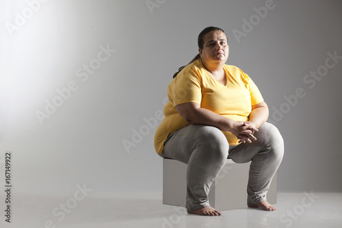 Canvastavla Portrait of an obese woman sitting